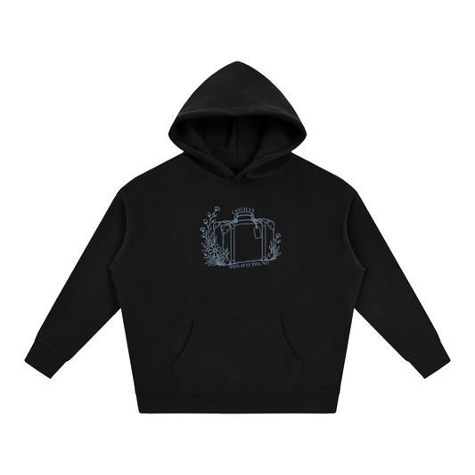 Catch Ya on the Flip Side oversized hoodie – Black hoodie with Powder Blue design, front view