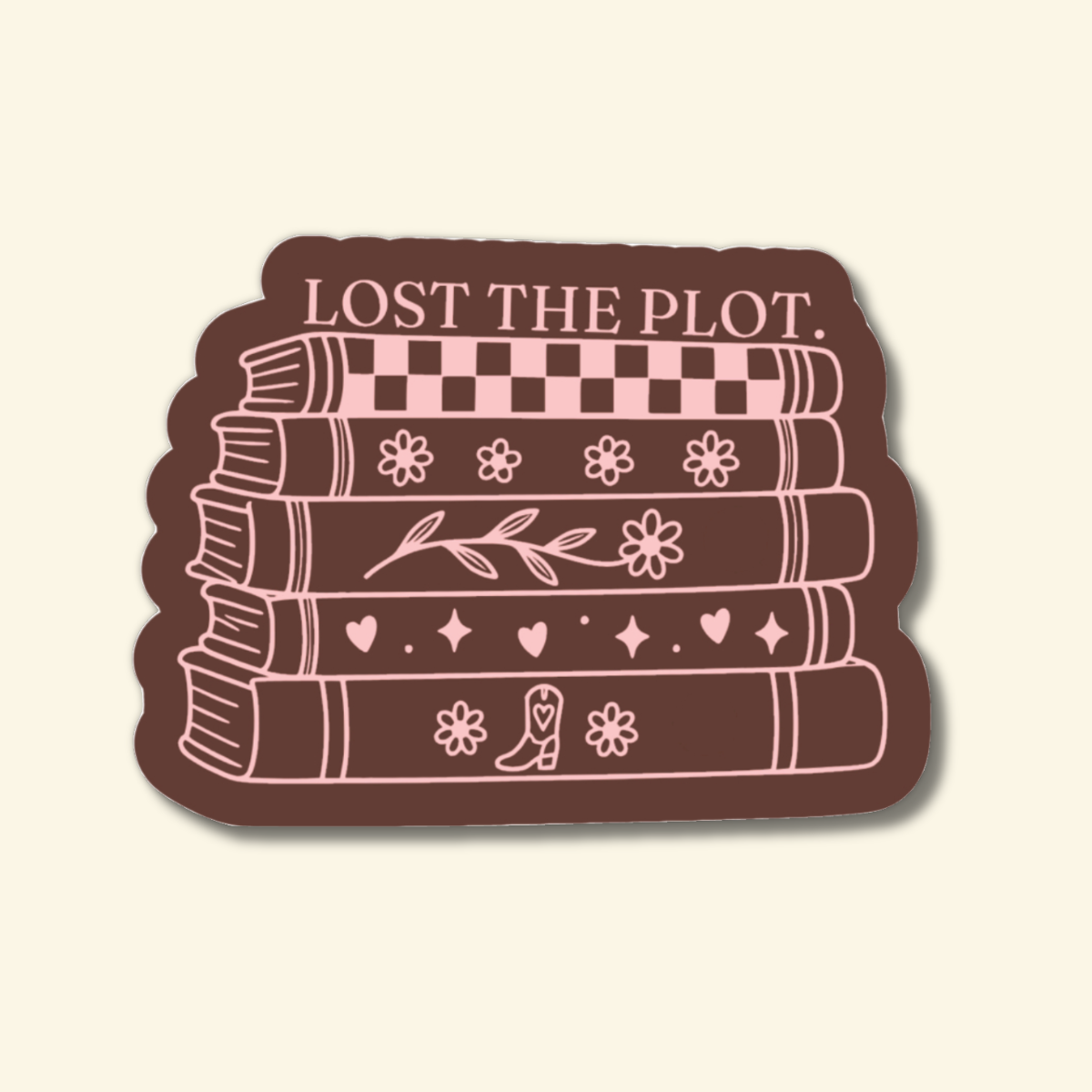 Lost the Plot stacked books sticker in brown and blush